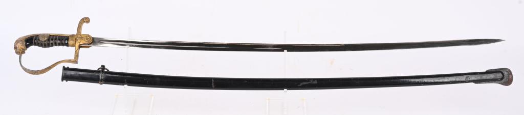 WWII NAZI GERMAN LION HEAD OFFICERS SWORD ANTON W: This example is roughly, 39 inches long slightly curved drop forged steel construction nickel/silver plated blade with narrow shallow fullers running three quarters of the way up both sides of the bla