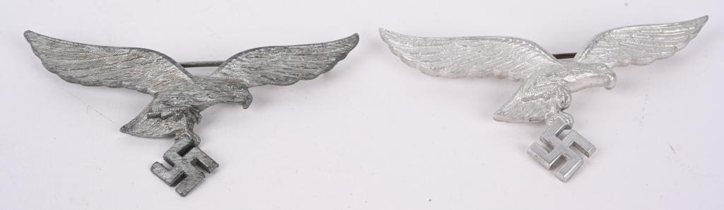 WWII NAZI GERMAN LUFTWAFFE OFFICER'S DRESS EAGLES: WWII Nazi German Luftwaffe Officer's Dress Breast Eagle lot to include 1) Luftwaffe Officers Summer Tunic Breast Eagle. In silvered aluminum Hallmarked A for Assmann. Excellent 2) Luftwaffe Officers S