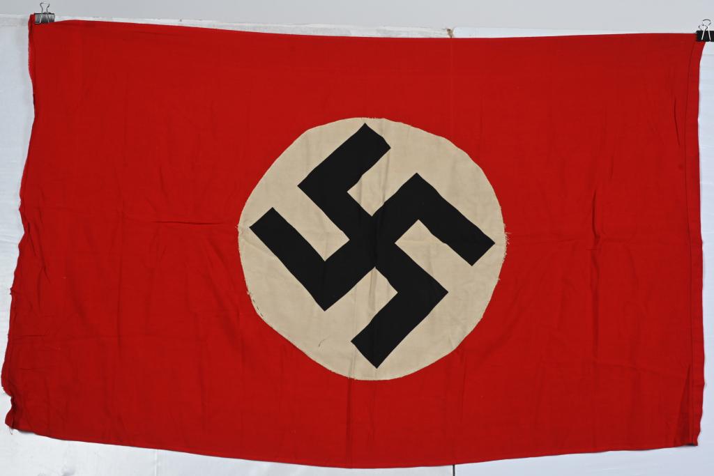 WWII NAZI GERMAN WALL BANNER 31X46 SINGLE SIDED: Multi-piece cotton construction banner approximately 31 x 46. To both its red fieldis a white disk, with a printed mobile swastika in black. Shows the expected age and light period use. Nice!Prob