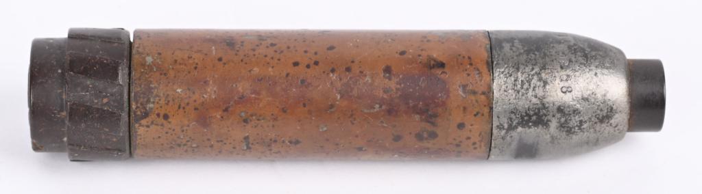 WWII NAZI GERMAN RIFLE GRENADE FOR K98 MNE 44 CODE: WWII Nazi German 98K Rifle Grenade and is coded mne44 and measuring 5 1/2 inches tall and still retains most of the original tan ordnance paint. Excellent The Schiessbecher (German spelling: Schie