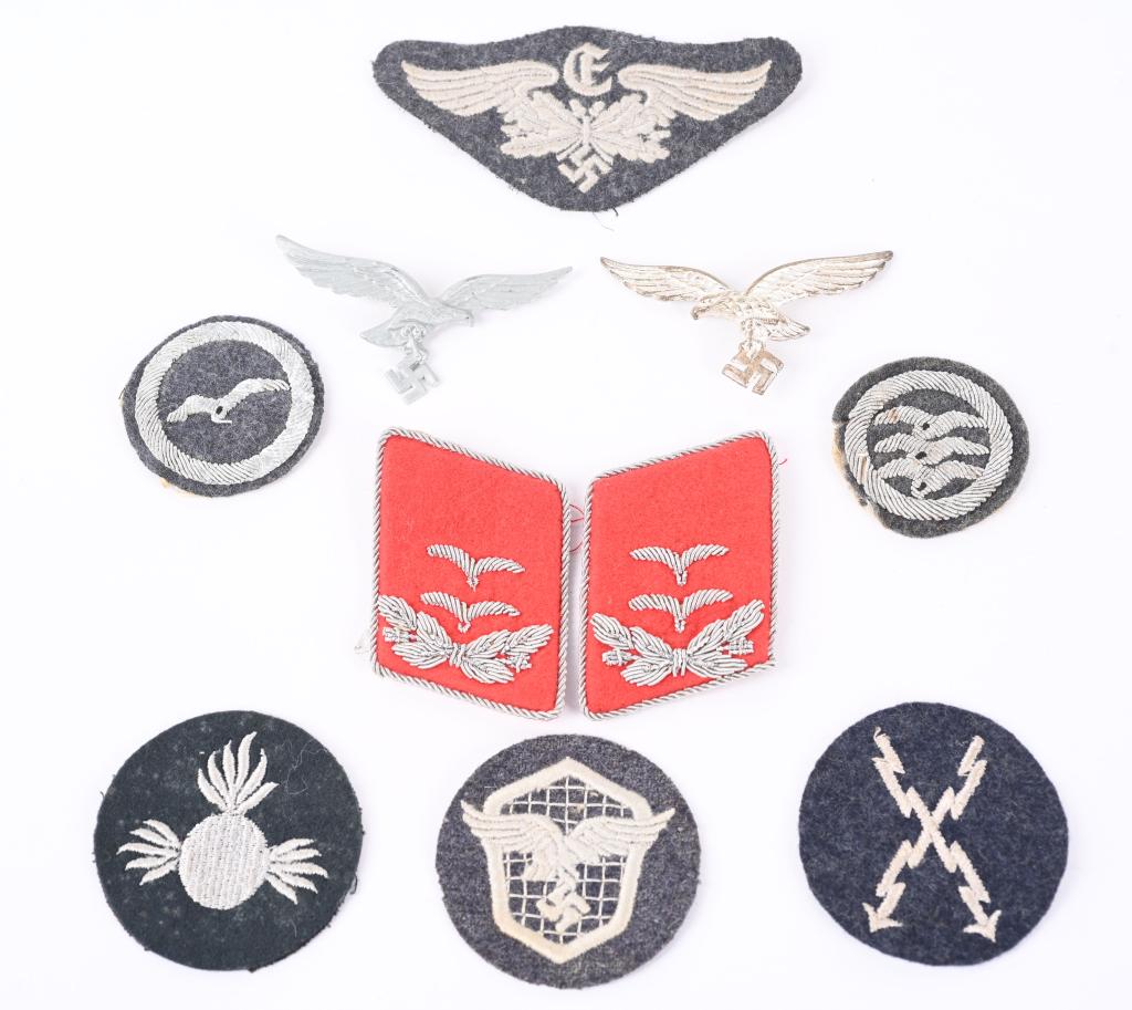 WWII NAZI GERMAN LUFTWAFFE INSIGNIA LOT PITH EAGLE: Lot of WWII Nazi German Luftwaffe insignia to include 1) TROPICAL PITH HELMET EAGLE. Nicely detailed die struck, aluminum construction, second pattern, left facing (Circa 1936/1937-1945), Lu