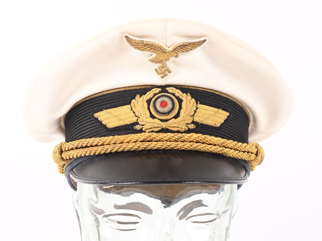 WWII NAZI GERMAN LUFTWAFFE GENERAL WHITE VISOR HAT: Nice quality, private purchase, General Officers white top visor cap consists of a removable, white, cotton/rayon blend, waffle, (pique), patterned top with white cotton/rayon blend piping to the forw