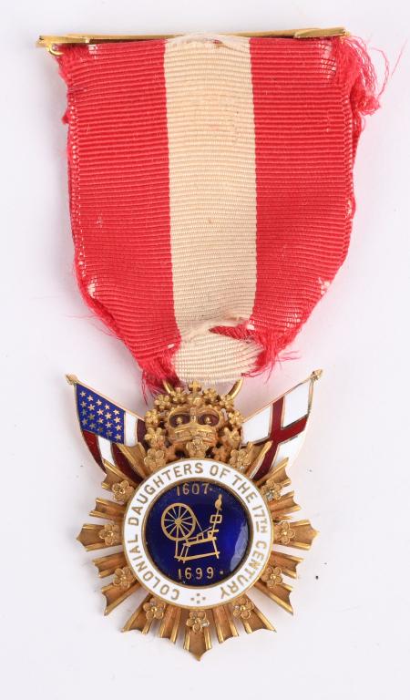 COLONIAL DAUGHTERS OF THE SEVENTEENTH CENTURY: United States. A Colonial Daughters of the Seventeenth Century Badge in Gold, c.1900In 14K Gold with red, white and blue enamels, weighing 9.9 grams, marked ""J.F.CR09"", ""14K"" (Gold) and engraved t