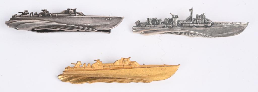 WWII U.S. NAVY PT BOAT BADGE LOT IN STERLING WW2: Lot of three PT-Boat badges to include 1) WWII U.S. ENLISTED NAVY PT BOAT TIE TACK - STERLING. World War Two 2.625" pin back sterling marked PT (Patrol Torpedo) boat badge. The reverse is well marked