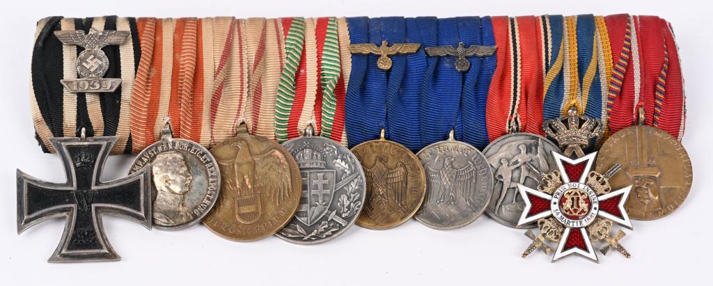 IMPERIAL GERMAN WWII NAZI GERMAN 9 PLACE MEDAL BAR: WWII Nazi German 9 placement medal bar to include 1) WWI 1914 2nd Class Iron Cross with Nazi 2nd Class Spange 2) WWI Austrian Silver Bravery “Fortitudini” Medal emperor Charles 3) Austrian