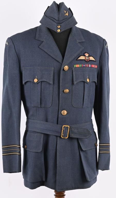 WWII CANADIAN PILOT UNIFORM GROUP w WINGS & CAP: WWII Group Captain, Canadian Service Uniform complete with overseas cap. Tunic is a typical 4 pocket service uniform that is adorned with Pilot Wings, Canadian Defence Medal, CANADIAN VOLUNTEER SERVIC