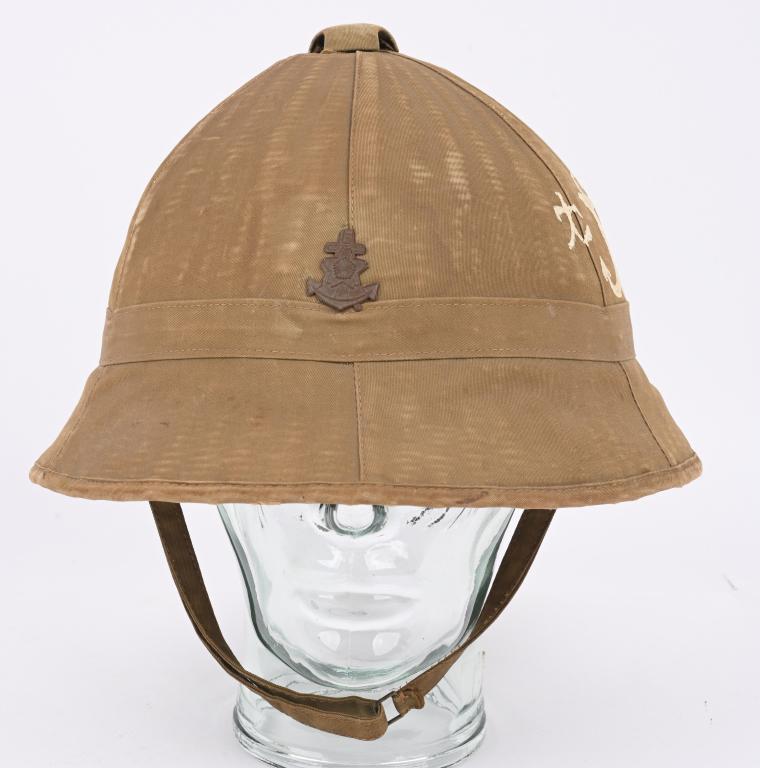 WW2 JAPANESE TROPICAL M38 LANDING FORCE SUN HELMET: Imperial Japanese Navy M38 enlisted issue helmet. Woven bamboo covered with light olive drab water-resistant, cotton drill cloth. The covering is comprised of six machine sewn pieces, meeting at the a