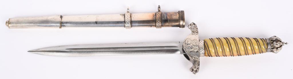 COMMUNIST BULGARIAN OFFICERS DAGGER PROTOTYPE: Dagger issued to an officer of the Bulgarian communist army. The dagger, 8 1/2 in. plain blade but is marked Solingen, 14 1/2 in. overall length, bears embellishments and a Maltese Cross with swords o