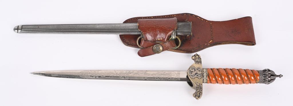 ROYAL BULGARIAN M1936 ARMY OFFICER DAGGER W HANGER: A Royal Bulgarian Army Officer's Dress Dagger - Measuring 16 1/2 inches in total length, this dagger features a 10 inch finely-detailed engraved plated blade, magnetic, with unshar