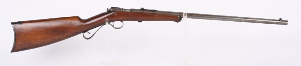 WINCHESTER MODEL 4 SINGLE SHOT 22 RIFLE: NSN. BARREL 21". CALIBER SHORT, LONG , EXTRA LONG. MADE 1902-1931. Round barrel, replaced rear sight, take down, blue finish, walnut perch belly stock with steel butt plate. Condition. Smooth gray pat