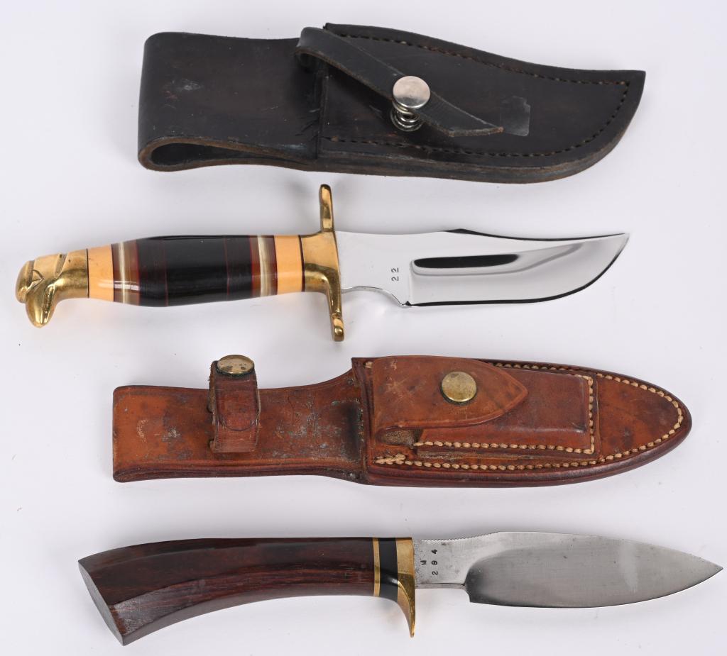 PAIR OF RALPH BONE AND REYNOLDS CUSTOM KNIVES: Ralph Bone Lubbock TX, custom crafted 4 1/2" skinner with rosewood handle and brass single guard with black and brass washer's. Comes in Johnson smooth back scabbard with white stone. Reynolds 4 3/4" 