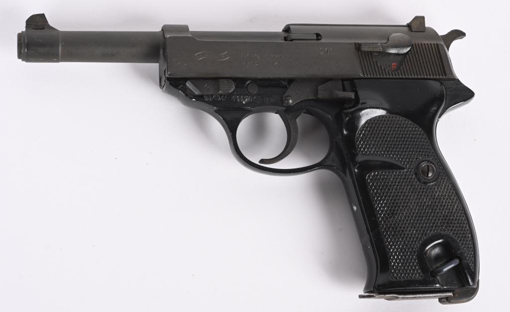 WALTHER P-1 SEMI AUTO PISTOL: SERIAL 054016. BARREL 4 3/4" CALIBER 9MM BUILT IN 1982, REBUILT 1989. Standard model, black enamel alloy frame, parkerized slide, black plastic grips, double action. Comes with two magazines. Conditio
