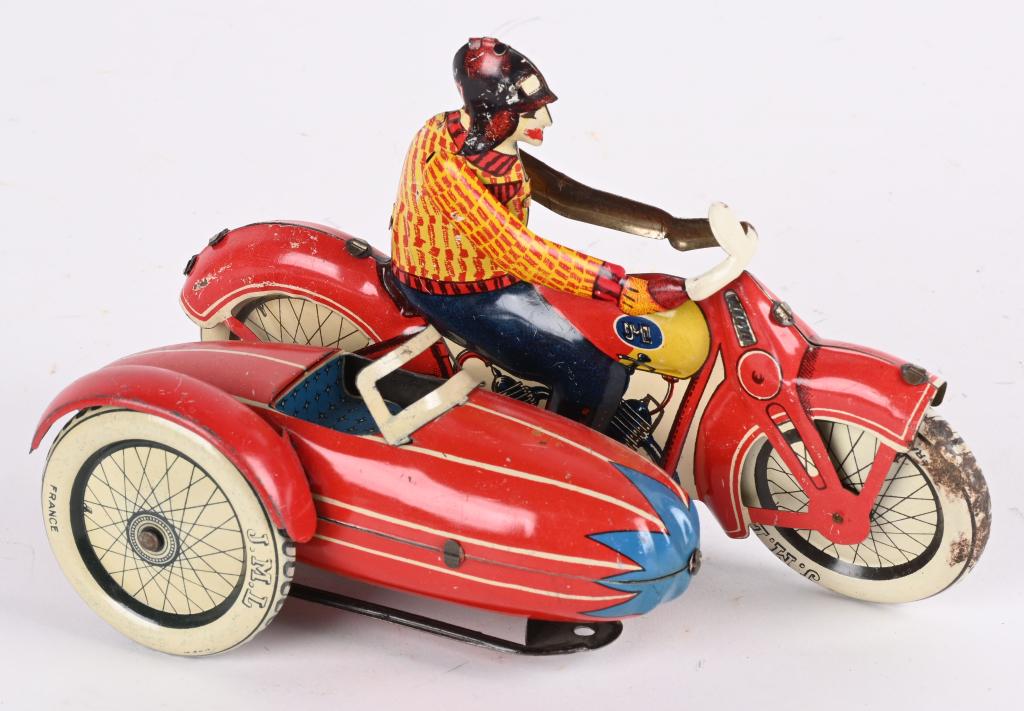 JML TIN WINDUP CIVILIAN MOTORCYCLE w/ SIDECAR: French tin windup Civilian Motorcycle with Sidecar. Bike has Bullet style Sidecar. Has nice colors. Windup works. An impressive looking bike. 8 1/4" Excellent