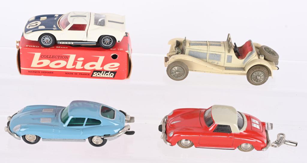 4- SCHUCO WINDUP CARS: All original in great shape. 1 Boxed. 4" Excellent