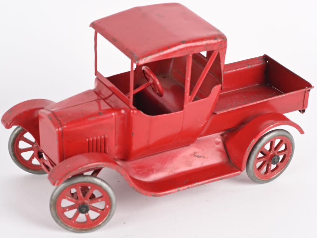 BUDDY L FLIVVER RED ROADSTER PICKUP: Nice original Flivver that has been repainted in Red. The toy does show some wear and age. Mostly inside the bed. A unique Buddy L. 12" Excellent