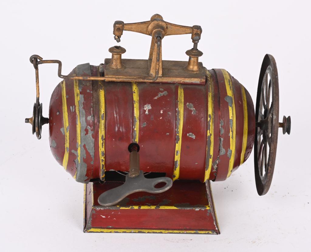 EARLY GERMAN WINDUP WALKING BEAM MOTOR: Early very unusual tin windup walking beam motor. It is hand painted soldered tin. Works for a long time when operated. Complete except for one small road which attaches to the beam. A unique early Ge