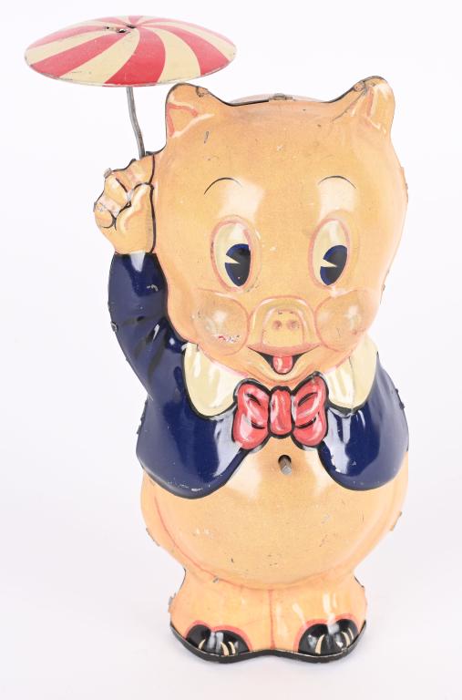 MARX TIN WINDUP PORKY PIG w/ UMBRELLA: Nice tin windup Porky Pig. Early dark coat version. Original umbrella has been reattached. Nice color and gloss. Works. Dated 1939 on back. 8 1/2" Excellent