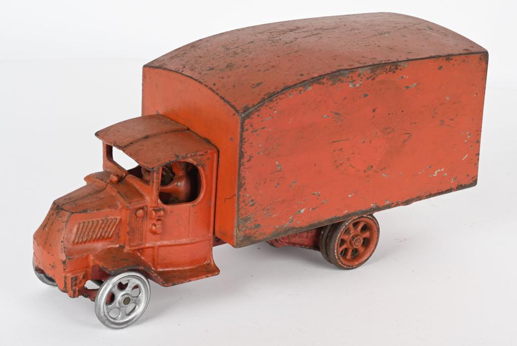 ARCADE CAST IRON LARGE MACK BOX TRUCK: Unusual well made Arcade truck that may be a prototype. The truck itself is a 12" Arcade Mack truck with dual rear wheels. The box appears seamless and is aerodynamic and perfect scale. The box is hel