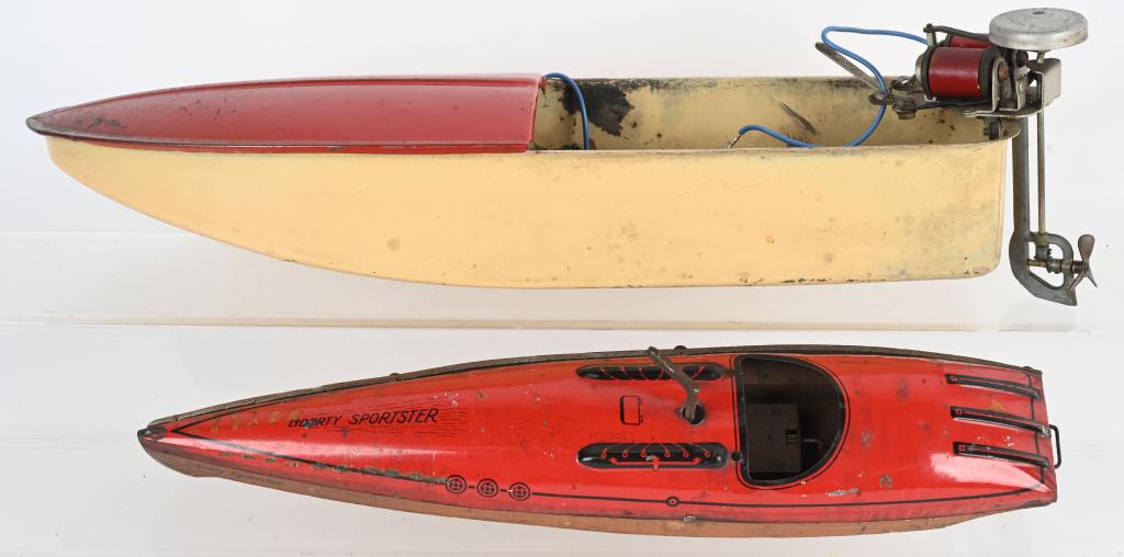 2- VINTAGE TOY BOATS: Includes Liberty Sportster tin and wood windup Boat and Pressed Steel battery operated boat with Outboard Motor. Both all original. Largest 20" Very Good-Excellent