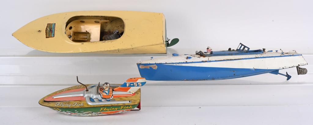 3- VINTAGE TIN BOATS: includes Japan windup Flying Fish, Straits Sea Hawk with loose motor, and JEP Ruben Bleu #2 Speed Boat missing windshield. All in original condition. Largest 19" Very Good-Excellent