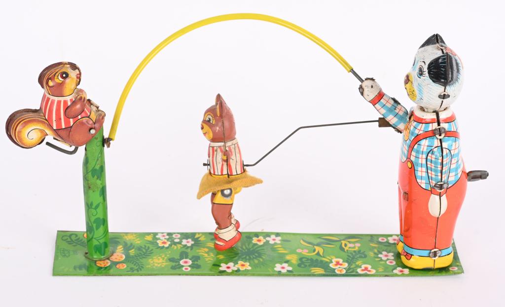 JAPAN T.P.S. TIN WINDUP SKIP ROPE ANIMALS: Complete and original. Worked well when tested. 8 1/2", Excellent