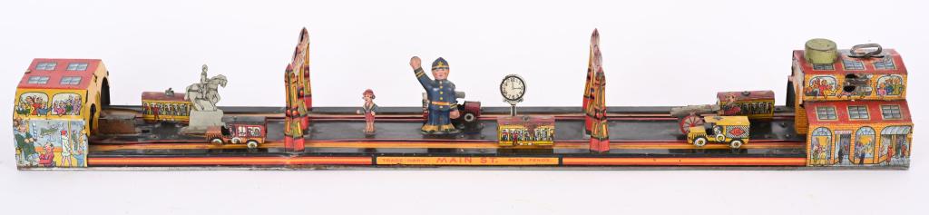 MARX TIN WINDUP MAIN STREET: All original and complete. Very nice colors and details. 24" Very Good-Excellent