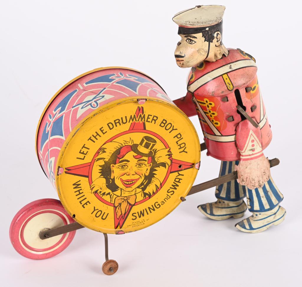 MARX TIN WINDUP BASE DRUMMER BOY: All original and complete. Windup works. Very Good-Excellent 9" Very Good