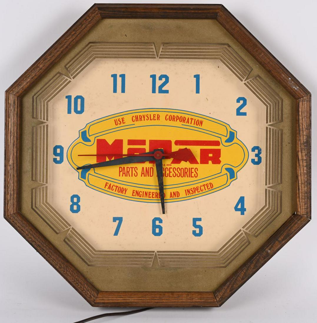 MOPAR PARTS & ACCESSORIES LIGHTUP CLOCK: Nice original Mopar Parts and Accessories Lightup Clock. All original wood frame. Has nice colors. Worked when tested. 19" Excellent