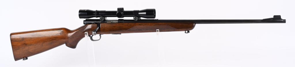 DELUXE WINCHESTER MODEL 43 CAL, 218 BEE: SERIAL NUMBER 23332a BARREL 24" CALIBER 218 BEE MANUFACTURED 1950. Produced with blue finish, 5 round detachable box magazine and varnished checkered pistol grip walnut stock with checkered steel butt