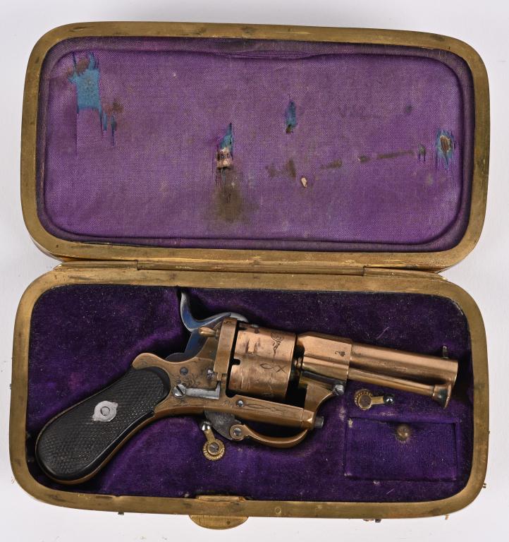 PIPE CASKET ALL BRASS LEFAUCHEUX PINFIRE REVOLVER: NSN. BARREL 2". CALIBER 5.5MM. Excellent example,Liege stamped pinfire mini revolver with folding trigger, engraved, solid brass, checkered ebony bag handle grips, fire blue hammer, Whole gun measures