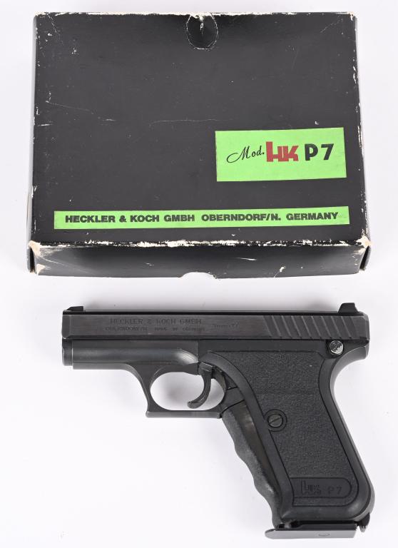 HECKLER & KOCH MODEL P7 WITH BOX: SERIAL NUMBER: 18987. BARREL: 4". CALIBER: 9MM LUGER. MANUFACTURED: 1981. Classic squeeze cocker design. Matching serials on the frame and slide. Factory 3-dot sights. Blued slide and frame. Textured 