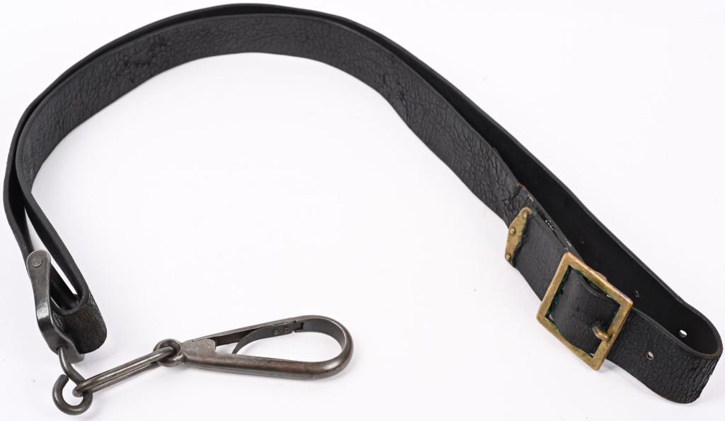 M1872 INDIAN WARS CARBINE SLING TRAPDOOR CARBINE: Indian War carbine sling & unmarked snap swivel hook. Original leather, snap hook and brass buckle. "Rock Island Arsenal" marked leather. Excellent Indian War U.S. Army Model 1870 Cavalry Carbine Belt