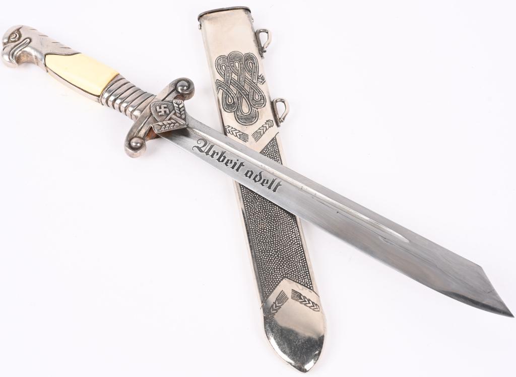 WWII NAZI GERMAN RAD LEADERS DAGGER BY EICKHORN: A Model 1937 Reichsarbeitsdienst Führer Haumesser by Ernst Carl Eickhorn of Solingen. The matte blade on this one is excellent condition. It also displays wonderful details throughout, with the b