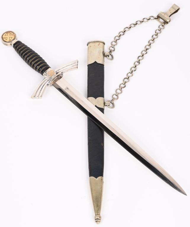 WWII NAZI GERMAN 1ST MOD. LUFTWAFFE DAGGER WW2: 1st Model (1934/35) Luftwaffe dagger and hanger with nickel silver crossguard, pommel, and scabbard fittings. Blade marked Albert Kuhl, Munster 1/w. Essen. Leather grip has minor wear with all wire w