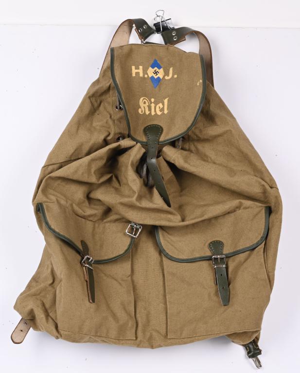 WWII NAZI GERMAN NAVY HITLER YOUTH BACKPACK WW2: WWII Nazi German Naval Hitler Youth Backpack measuring 21 X 22 1/2 still retaining all the original straps and roller buckles and is identified to the Navy unit of Kiel of the Hitler Youth. Excellent.