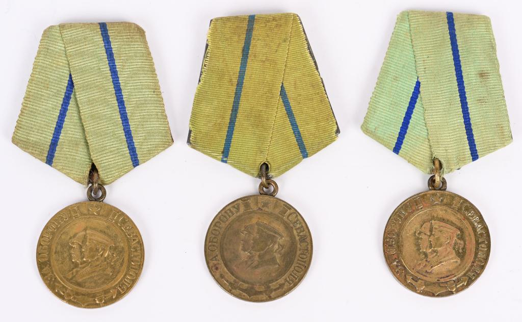 WWII SOVIET UNION DEFENCE OF SEVASTOPOL MEDAL LOT: Lot of three medal from the Soviet Union. All three medals are for the Defence of Sevastopol. Established on December 22, 1942 and was awarded for participation in the defense of Sevastopol. The 32mm 