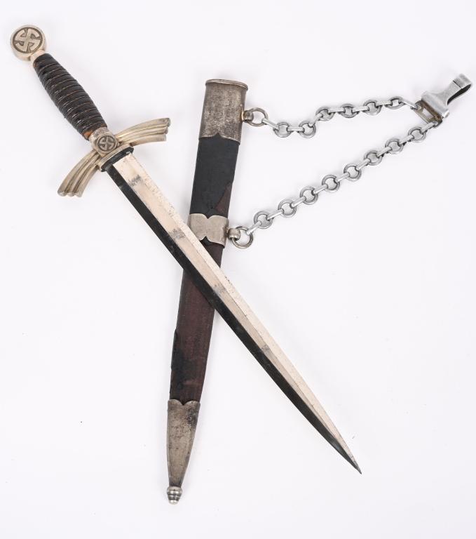 WWII NAZI GERMAN LUFTWAFFE DAGGER BY F.W. HOLLER: Early (circa 1936-1937) roughly 30.5cm long bright nickel/silver plated drop forged steel double edged stiletto style blade with a flat central plane. The reverse ricasso is well marked with acid etch