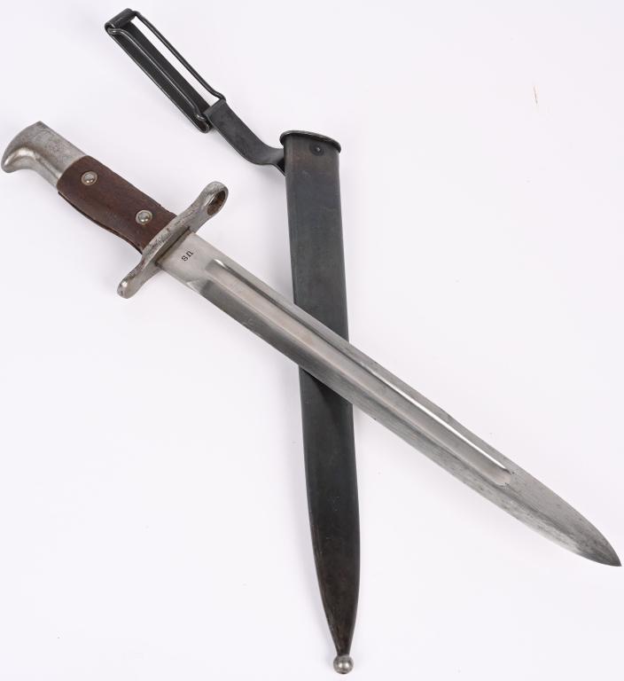 US SPRINGFIELD KRAG BAYONET 1900 DATED W/ SCABBARD: Krag – Jorgensen bayonet used on the model 1892 Krag rifle. It is the first knife-bayonet issued in the U.S. The sharpened blade shows some metal scarring. It measures approx. 11 & 13/16 inches 