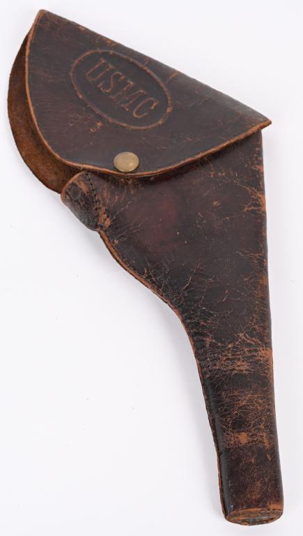 LEATHER USMC .38 COLT 1905 FLAP HOLSTER: Manufactured 1889-1911 for the Colt 1889-1903 revolver and later for the .38 Colt USMC revolver. Manufactured of russet leather with USMC embossed on flap with blank brass snap closure and sewn leathe