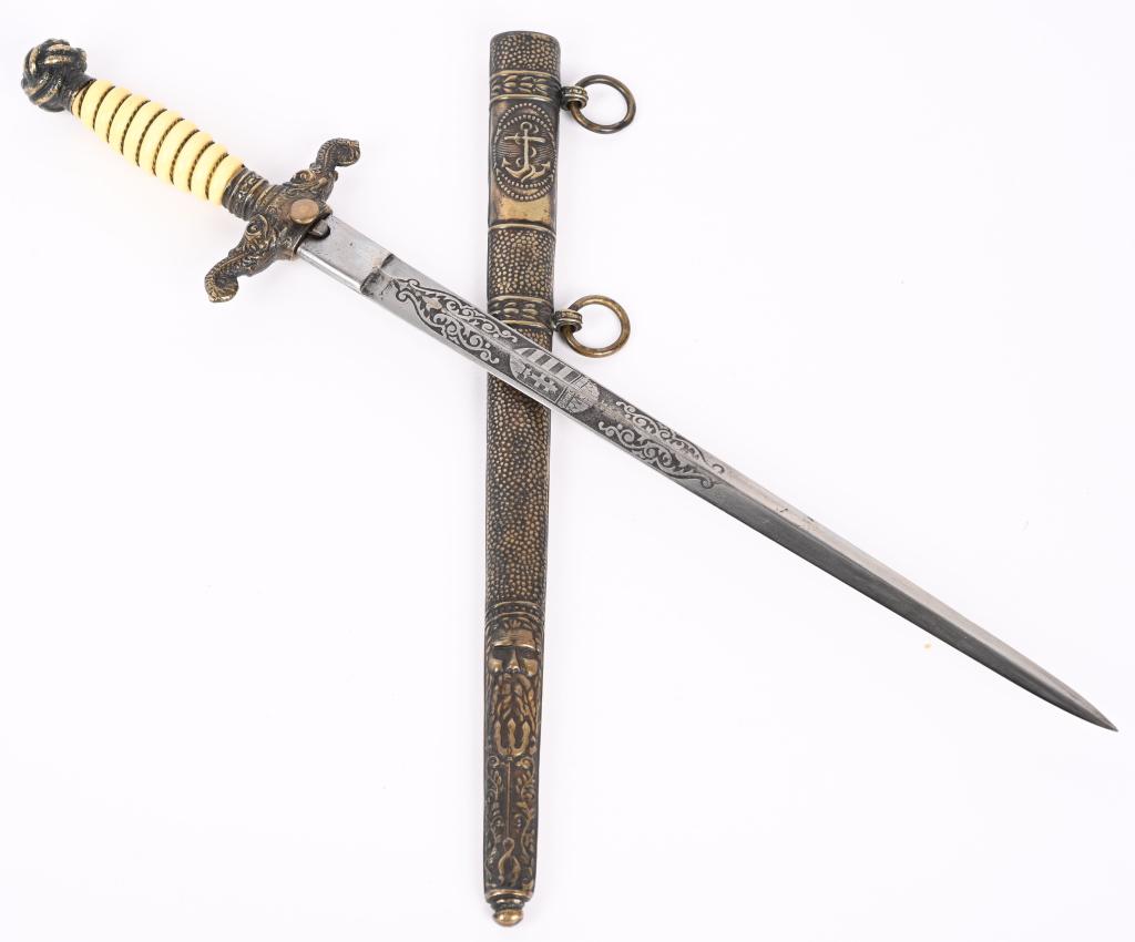 WWI AUSTRO-HUNGARIAN NAVAL OFFICERS DAGGER WW1: WWI Austro-Hungarian Naval Officers Dagger and brass scabbard. Beautiful engraved blade with KUK Coat of Arms on one side and Anchor on the other with high luster. Excellent Condition