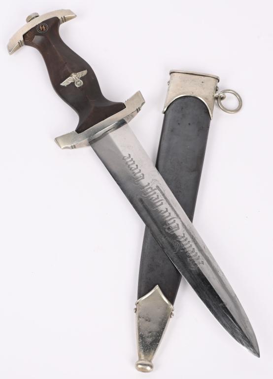 WWII NAZI GERMAN SS M33 DAGGER BY E. PACK & SOHN: Nickel/silver plated blade shows the typical light scabbard runners and minimal light surface spotting and scratches. Cross graining is still evident. Well defined acid etched motto, "Meine Ehre Hei&#