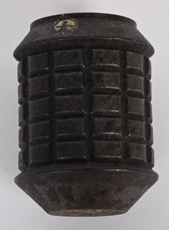 WWII JAPANESE INERT TYPE 97 HAND GRENADE W KANJI: INERT WWII Japanese Type 97 hand grenade but missing the original fuse assembly. There is Kaji written around the top. Very Good.History and developmentThe Type 97 was developed from the earlier Type