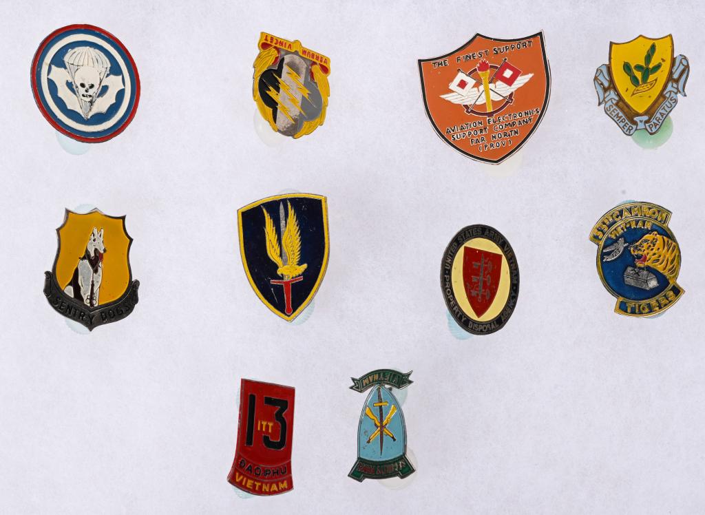 VIETNAM BEER CAN DI'S LOT AVAITION PSYOPS AIRBORNE: Vietnam Theater made Beer Can DI's Distinctive Insignia lot brought back by an MP who served in the Vietnam Conflict to include 1) Sentry Dogs Beer Can DI. Hard to find DI for a K-9 Unit. 2) 33rd CAMR