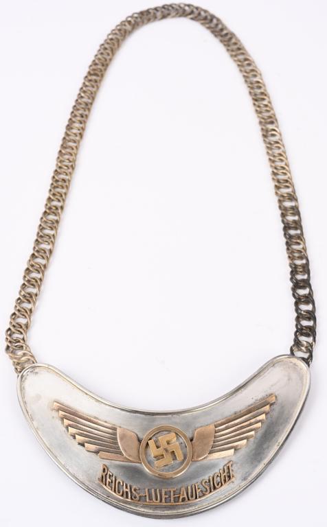 WWII LUFTWAFFE AIR TRAFFIC CONTROLLER'S GORGET WW2: Gorgets hold an interesting place in history, as they are a throw-back to the days of knights, when suits of armor included a neck protection device called a Gorget. They have been used since that tim