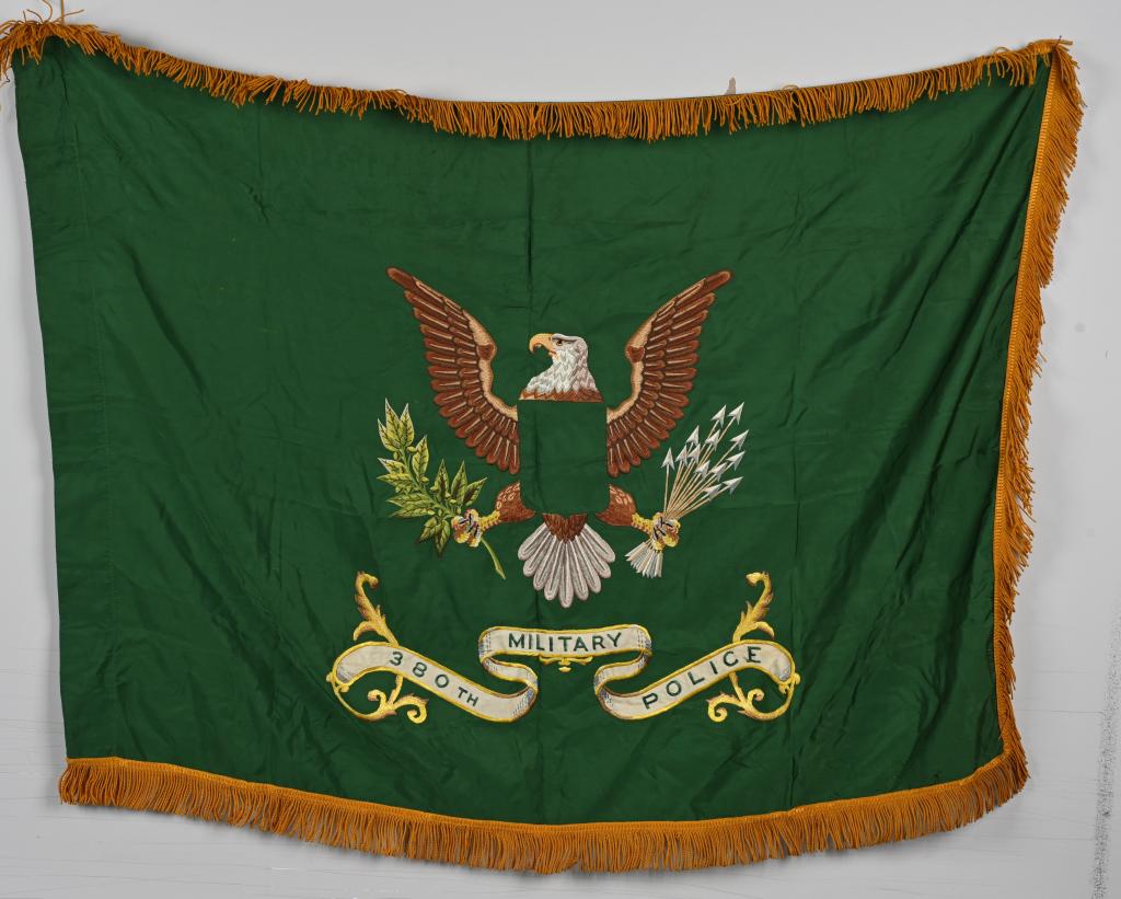 RARE 380TH MILITARY POLICE REGIMENTAL SILK FLAG: US 380th Military Police Battalion Regimental Flag measuring 34 X 48 excluding the trim. There is a Quartermasters tag on the inside of the fly but is difficult to read but the date appears to be in t