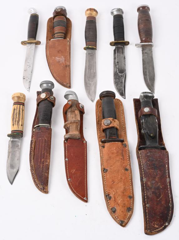 LOT OF 9 KNIFE LOT MARBLES KABAR CASE WESTERN: Large lot of civilian sheathed knives to include 1) Western knife with no scabbard measuring 9 3/8 with a leather washer handle with some spotting to the blade. 2) Western Side Knife in leather scabba