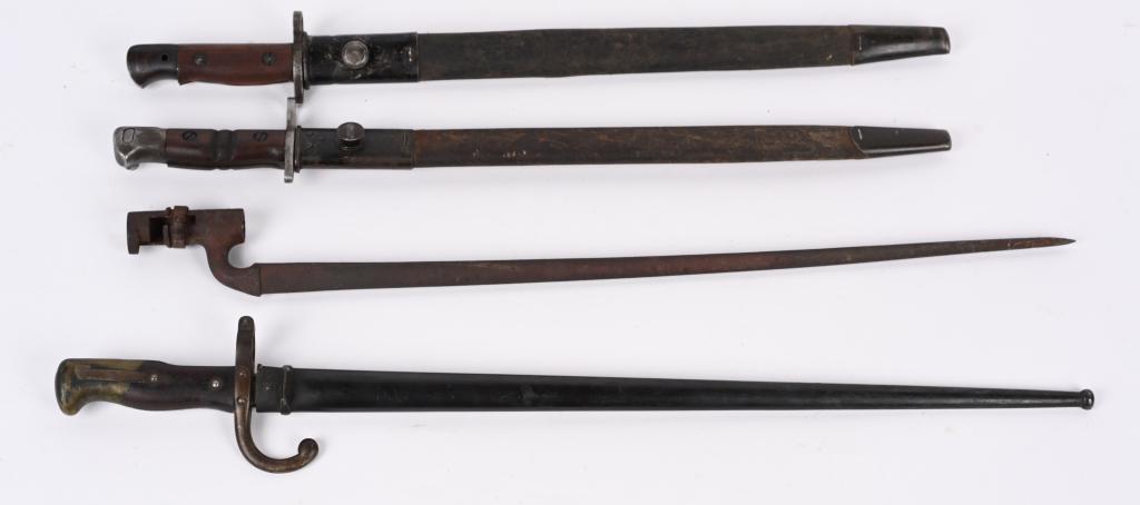 INDIAN WAR WWI BAYONET LOT BRITISH ENFIELD GRAS: Military bayonet lot to include 1) Military Infantry Gras Bayonet with Scabbard. Bayonet is in excellent condition with matching numbers and is maker marked and dated 1879. 2) Springfield Trapdoor Bay