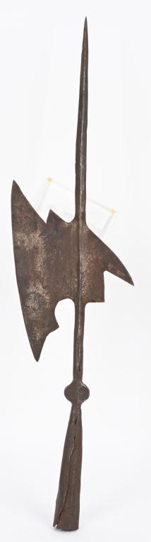 EARLY HALBERD BATTLE BLADE HEAD FOUR LEAF PATTERN: Halberd head measuring 28 1/2 inches tall and made of Iron with four leaf clover pattern to each side. Very Good. A halberd (also called halbard, halbert or Swiss voulge) is a two-handed pole weapon t