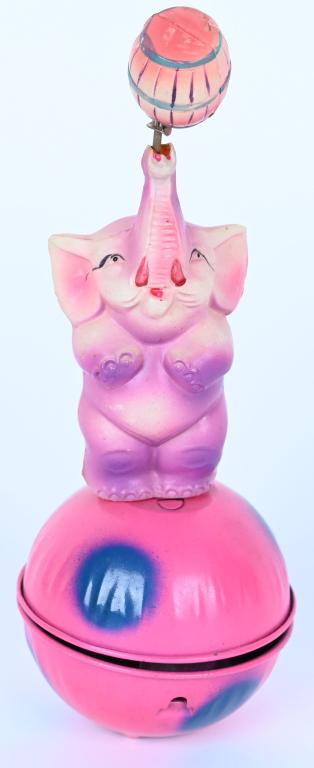 JAPAN TIN & CELLULOID WINDUP CIRCUS ELEPHANT: Japan tin and celluloid windup Circus Elephant. All original with great colors. Windup works. 7 1/2" Excellent