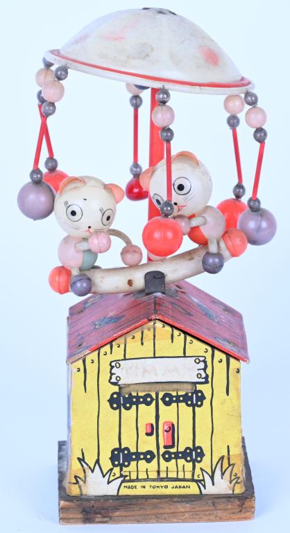 JAPAN CELLULOID WINDUP ANIMAL SEE-SAW: Japan windup celluloid Animal See-Saw. All original and works. 10" Excellent
